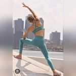 Alo Yoga Airlift Intrigue Bra & High-Waist 4 Pocket Utility Legging Set Photo 1