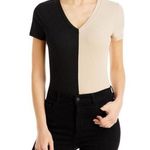 AQUA Ribbed Black and Tan Short Sleeve Bodysuit Photo 0