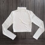 Princess Polly | 90s Y2K Nicola Long Sleeve Ruffled Mock Neckline White Crop Top Photo 2