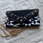 Black and White Geometric Clutch with Gold Chain Photo 0