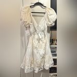 NWT Rubienn Eyelet Tired Back Tie Frill Mini Dress In Off White Photo 10