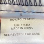 Romeo + Juliet Couture romper in orange and navy. Photo 5