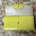 Coach Yellow Wallet Sleek Minimalist Design Photo 1