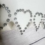 White Ribbed Long Sleeve Crop Top with Rhinestone Heart Detailing Size Medium Photo 4