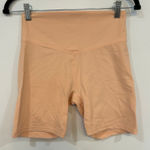 Vuori  Womens Biker Shorts Medium Peach Athletic High Rise Stretch Spandex Photo 0