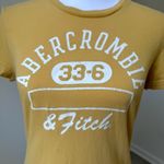 Abercrombie & Fitch Yellow Baby Tee Photo 1