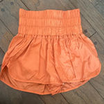 FREE PEOPLE Movement The Way Home Short in Russet Orange Size XS Photo 0