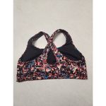 Under Armour  Sports Bra Women’s Sz L Mid Crossback Splatter Printed Photo 1