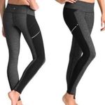 Athleta  Criss Cross Drifter Legging Size XS Gray Black Zip Pockets Photo 1
