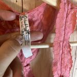 Free People  Women’s Galloon Racerback Lace Bralette in Pink size Small Photo 1