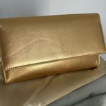 Pandora Gold tone clutch Photo 0