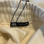 ZARA sweatpants. White with green accent stripe. Photo 5