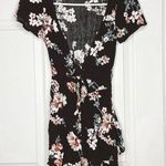 American Eagle tie front floral cutout romper Photo 0