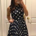 Adrianna Papell Gorgeous Navy and White Polka Dot Tea Dress with pleated skirt. Photo 3