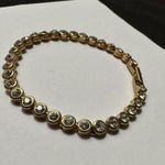 Women’s Signed Avon Gold Tone Clear Rhinestone Tennis Bracelet 7.5 Inch Photo 0