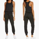 Sweaty Betty  Gary Jumpsuit Scoop Neck Sleeveless Racerback in Black Size L Photo 1