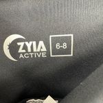 Zyia  active size medium‎ 6 8 black athletic leggings with side pockets camo Photo 3