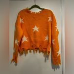 Zaful  Star Print Cropped Chewed Hem Sweater Orange and White LongSleeve One Size Photo 12