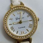 Geneva platinum woman’s 30mm gold tone watch rhinestones white dial runs Photo 1