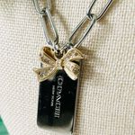 Coach  Gold Bow and Silver Hangtag Necklace Photo 0