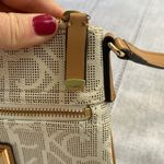 Calvin Klein NWOT monogram crossbody bag. Photo 4