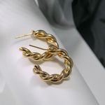 Gold twist hoop earrings Photo 1