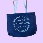 Wythe Hotel Williamsburg Brooklyn NYC Blue and navy tote bag with white writing Photo 1