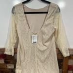NWT low back crème lace dress. Size L Photo 1