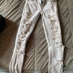 American Eagle Ripped Jeans Photo 1