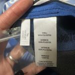 Karl Lagerfeld NWT  Paris Geometric Logo Blouse button up Long Sleeve shirt Blue choose your size msrp $89 All size available  New with tag  Same day shipping  Smoke and pets free  Add a luxurious touch to your wardrobe with this  Paris Geometric Logo Blouse button up Long Sleeve shirt. The shirt features a stylish geometric pattern in blue, black, and white colors, perfect for any occasion. It comes in sizes S/M/L/XL and is made of lightweight, breathable polyester that makes it suitable for all seasons. Super silky flowy.   The shirt's oversized design and packable feature make it a perfect addition to your fashions. The shirt is a part of the Paris Theme and has long sleeves, ideal for the colder months. The shirt is suitable for any size and does not compromise on quality. Photo 8