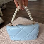 Francesca's Blue and gold purse Photo 6