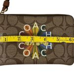 Coach EUC Rainbow Radial Print Khaki and Tan Pride Small Corner Zip Wristlet Photo 13