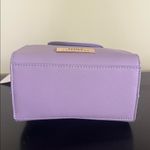 Trina Turk double handle tote in lilac with a removable crossbody strap Photo 8