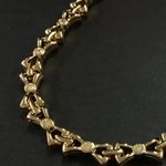 Nina Ricci gold and crystal bow chain necklace Photo 5