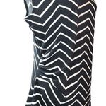 cj banks  black top with white chevron striped top! Ruched on side and flared hem Photo 0
