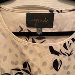 Super cute silky cream and black cocktail dress! Size XS Photo 1