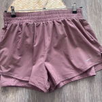 Nike  Maeve‎ dusty pink running shorts Photo 0