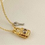 Coach  Signature Padlock and Key NecklaceGold Chain and Silver Key Photo 1