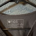 FIGS Women’s  Black Technical Collection Scrub Top Photo 1