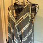 Alya sleeveless crisscross wrap style blouse Photo 1