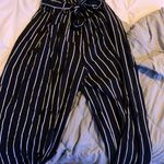 New Look Black And White Striped Flowy Pants Photo 1