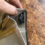 Fossil  Black cow hide leather wallet with gold leather lining Photo 10