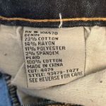 Tractr: Stretchy Skinny Jeans with red flannel covered holes Photo 2