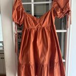 Olivaceous Burnt orange babydoll puff sleeve sundress Photo 1