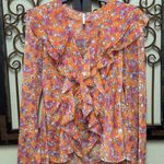 Free People Nina long sleeve sheer chiffon floral ruffle top with raw edges Photo 5