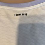 Adidas  primeblue size small lavender front longer white back cap sleeves GUC Photo 8