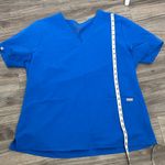 FIGS  Royal Blue Scrub Top – Premium Medical Uniform with V-Neck. Photo 8