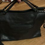 Black shoulder bag with studded accents Photo 3