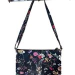 Floral purse, shoulder strap or clutch, black background with bright flowers Photo 1