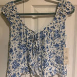 No Boundaries Juniors Ruched Top with Puff Sleeves in a blue and white floral pattern.  Photo 0